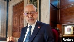FILE - Parliament Speaker Rachid Ghannouchi, head of the Islamist Ennahda, is pictured in Tunis, Tunisia, March 9, 2021. Resignations of 113 party members on Sept. 25, 2021, followed charges that the party has failed to counter what they view as a presidential takeover.