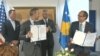 Kosovo, Pristina, Adam Boelher and Avullah hoti signing the economic treaty