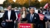 Former New York City Mayor Rudy Giuliani, personal attorney to U.S. President Donald Trump, speaks near Eric Trump and his wife Lara Trump during a news conference at Atlantic Aviation PHL private air terminal in Philadelphia, Pennsylvania, Nov. 4, 2020.