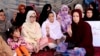 Pakistani lawyer Jalila Haider, center, from Hazara Shi'ite minority community participates in a hunger strike with others at a camp in Quetta, April 30, 2018. 
