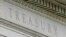 FILE - This May 4, 2021 file photo shows the Treasury Building in Washington.
