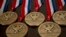 FILE - National Medals of Technology and Innovation are seen in the East Room of the White House in Washington.