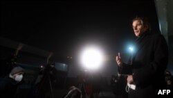 Director General of the International Atomic Energy Agency (IAEA) Rafael Mariano Grossi addresses the media after his arrival at Vienna International Airport on February 21, 2021. (Photo by ALEX HALADA / AFP)