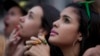Fans watch a live telecast of the Mexico vs. Brazil match at the FIFA Fan Fest during the 2014 soccer World Cup in Sao Paulo, Brazil, June 17, 2014.