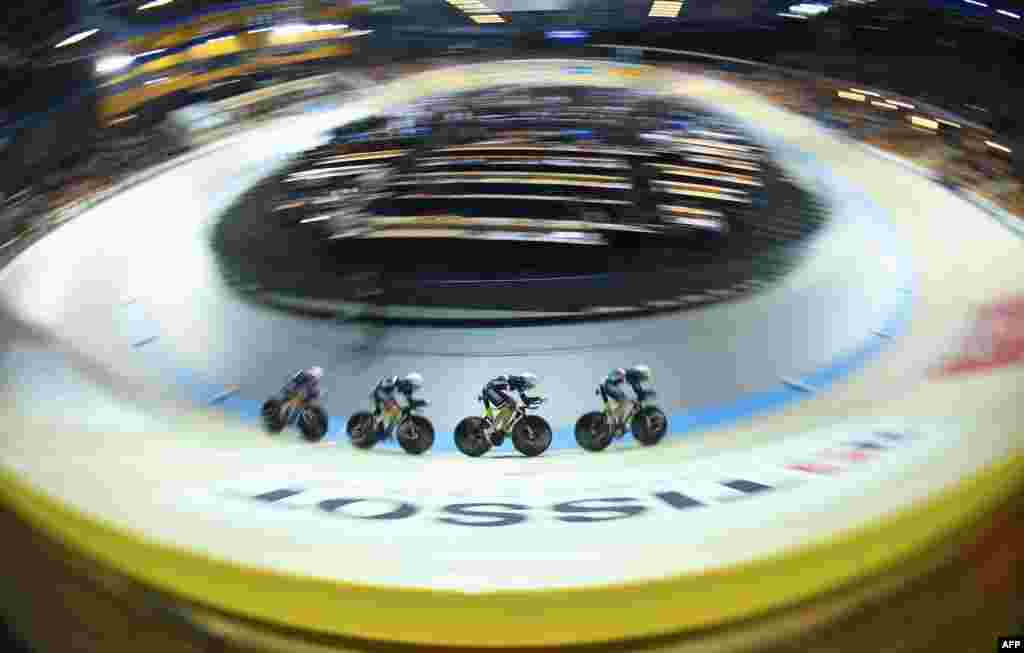 France&#39;s team competes in the Women&#39;s Team Pursuit qualifying round during the UCI Track Cycling World Championships in Apeldoorn, Netherlands.