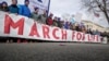 Anti-abortion activists march past the Supreme Court in Washington, Jan. 27, 2017, during the annual March for Life.