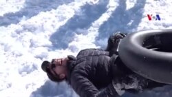 تیوب سواری روی برف‌ در بامیان‌