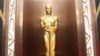 FILE - An Oscar statue is on display in Los Angeles, March 2, 2104. 