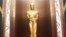 FILE - An Oscar statue is on display in Los Angeles, March 2, 2104. 