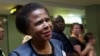 Former South African anti-apartheid activist Mamphela Ramphele speaks to reporters at the East London airport in Eastern Cape, South Africa, after arriving to attend the late former South African President Nelson Mandela's funeral, Saturday, December 14, 