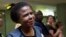 Former South African anti-apartheid activist Mamphela Ramphele speaks to reporters at the East London airport in Eastern Cape, South Africa, after arriving to attend the late former South African President Nelson Mandela's funeral, Saturday, December 14, 