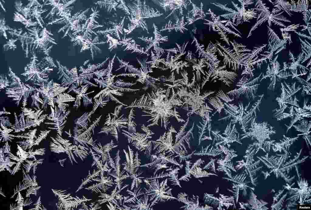 A window with a natural frost pattern is pictured on top of the highest German mountain, the Zugspitze, in Garmisch-Partenkirchen, Germany, Feb. 28, 2018.