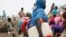 At the Jamam refugee camp, shows people gathering water in South Sudan's Upper Nile state, where over 100,000 refugees have fled conflict in Sudan's Blue Nile state since September, June 15, 2012.