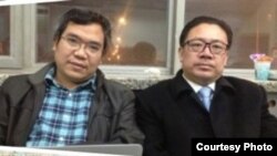 王誓华（左）、周泽（右）在北新桥派出所彻夜声援李建军（微博图片/李蒙不蒙你）