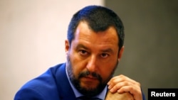 FILE - Italy's Interior Minister Matteo Salvini looks on during a news conference in Rome, June 20, 2018. 