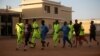 FILE - Former members of the militant group al-Shabab are held inside a prison in Garowe, Puntland state, in northeastern Somalia, Dec. 14, 2016. 