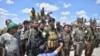 FILE - Soldiers participating in operation to liberate Raqqa, Syria, from Islamic State militants, May 24, 2016. (ANHA photo)