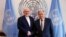 Iranian Foreign Minister Mohammad Javad Zarif, left, shakes hands with U.N. Secretary General Antonio Guterres at United Nations headquarters, July 18, 2019. 