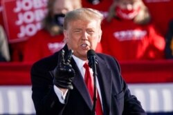 President Donald Trump speaks at a campaign rally, Oct. 30, 2020, at the Austin Straubel Airport in Green Bay, Wis.