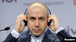 Юрий Мильнер