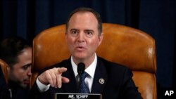 House Intelligence Committee Chairman Adam Schiff, D-Calif., questions Jennifer Williams, an aide to Vice President Mike Pence, and National Security Council aide Lt. Col. Alexander Vindman, testify before the House Intelligence Committee on Capitol Hill.