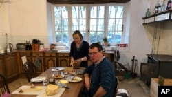 Andrew Nixey, a beef farmer from Britain who rears cattle in France, and his wife, Margaret, have lunch in their farmhouse in Saint-Martial-sur-Isop, France, Jan. 27, 2020.