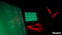 컴퓨터 해커를 묘사한 일러스트.