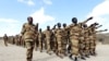 FILE - Somalia soldiers take part in a military exercise, March 17, 2014. A new army chief was appointed on Aug. 22, 2019. 