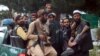 Taliban fighters arrive inside the Hamid Karzai International Airport after the U.S. military's withdrawal, in Kabul, Afghanistan, Aug. 31, 2021.