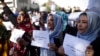 Afghan women chant during a protest in Kabul, Afghanistan, Oct. 21, 2021.