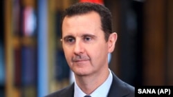 Bachar Al-Assad à Damas, le 25 septembre 2015. (AP Photo/SANA)
