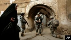 People enjoy the sunny weather on the island of Mainau in Lake Constance, Germany.