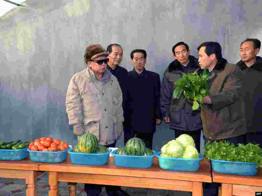The late North Korean leader Kim Jong Il inspects the Hoesang area farm in Hamhung city in South Hamgyong province, North Korea. (Undated file photo released shortly after his death, December 2011)