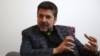 FILE - Rahmatullah Nabil, a former head of Afghanistan's secret service speaks during an interview in Kabul, Afghanistan.