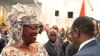 This handout photo shows Senegal's new president Macky Sall (R) greeting his wife Mareme Faye Sall, after the swearing-in ceremony Dakar on April 2, 2012.