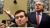 Benjamin Brafman, right, attorney for pharmaceutical chief Martin Shkreli, foreground, speaks on Capitol Hill in Washington, Feb. 4, 2016, during a House Committee on Oversight and Reform Committee hearing on rising drug prices. 