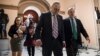Senate Minority Leader Chuck Schumer, D-N.Y. (L) walks with Sen. Dick Durbin, D-Ill., the minority whip, as lawmakers continue negotiating on a deal that would include a fix for the Deferred Action for Childhood Arrivals (DACA) program, at the Capitol in Washington, Jan. 11, 2018. 