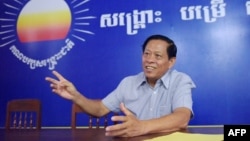 FILE - This photo taken on October 17, 2017 shows Lim Kimya, a member of the National Assembly from Cambodia National Rescue Party, speaking during an interview with AFP in Phnom Penh.