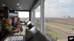 Архівне фото: президент Росії Володимир Путін, міністр оборони Росії Сергій Шойгу, листопад 2021 року