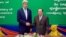 U.S. Secretary of State John Kerry, left, shakes hands with Cambodian Foreign Minister and Deputy Prime Minister Hor Namhong before a bilateral meeting at the Ministry of Foreign Affairs in Phnom Penh, Cambodia, Jan. 26, 2016.