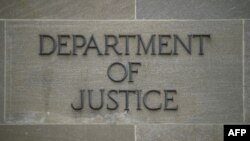 រូបឯកសារ៖ ក្រសួង​យុត្តិធម៌​អាមេរិក​នៅ​រដ្ឋធានី​វ៉ាស៊ីនតោន​កាលពី​ថ្ងៃទី១៨ ខែមេសា ឆ្នាំ២០១៩។ (AFP)