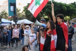 At demonstrations in Lebanon, protesters demand government reforms, but the government is barely functioning at the moment, in Beirut, Nov. 22, 2019. (Heather Murdock/VOA)