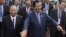 Cambodia's Prime Minister and President of the People's Party, Hun Sen, center, arrives at an event marking the 38th anniversary of the 1979 downfall of the Khmer Rouge regime in Phnom Penh, Cambodia, Saturday, Jan. 7, 2017. (AP Photo/Heng Sinith)