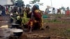 Congolese families, who fled from Democratic Republic of, prepare meals at United Nations High Commission for Refugees' (UNHCR) Kyangwali refugee settlement camp, Uganda, Mar. 19, 2018. 