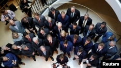 U.S. House Republicans speak to reporters after Deputy Assistant Secretary of Defense Laura Cooper arrived to testify at a closed-door deposition as part of the U.S. House of Representatives impeachment inquiry into U.S. President Trump.