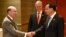 U.S. Secretary of Commerce Wilbur Ross shakes hands with China's Premier Li Keqiang, as U.S. National Security advisor Robert O'Brien watches, as they attend a bilateral meeting on the sidelines of the 35th Association of Southeast Asian Nations …
