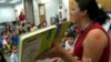 Children listen to a story in Spanish at the Bull Run Public Library in Prince William County, Virginia. (VOA/A. Greenbaum)