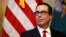 FILE - U.S. Treasury Secretary Steven Mnuchin is seen during a ceremony at the Treasury Department in Washington, Nov. 27, 2017.