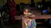  A Muslim child sits inside the St. Pierre church where she and hundreds of other Muslims are seeking refuge in Boali, Central African Republic, some 80kms (50 miles) north-west of Bangui, Thursday, Jan. 23, 2014. Clashes erupted between Anti-Balaka Chri