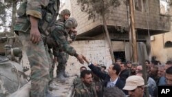  Prezidaantii Siiriyaa Bashaar Alasaad yeroo humna waraanaa biyyatti dubbisan